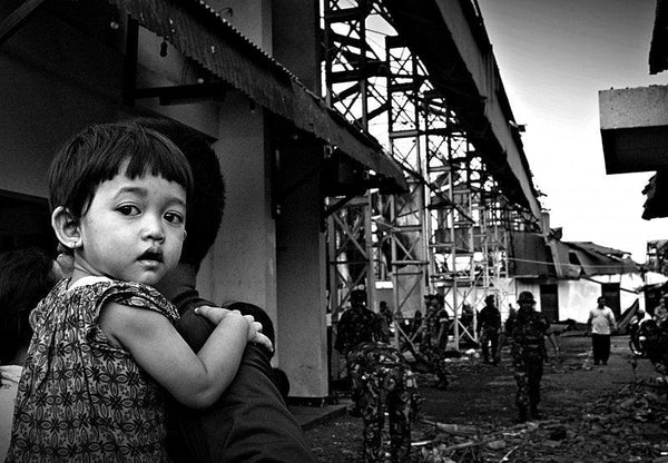 Portrait photography titled 'After Earthquake', 11x16 inches, by artist Rahmat Nugroho on