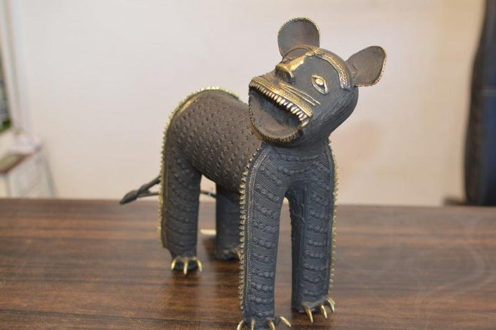 Animals sculpture titled 'Baghel Tiger Small', 11x11x4 inches, by artist Kushal Bhansali on Brass