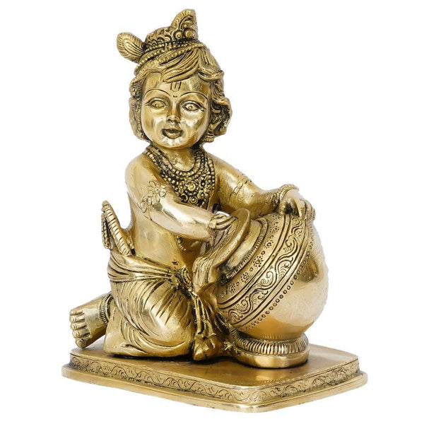 Religious handicraft titled 'Bal Gopal Krishna Having Makhan', 7x5x4 inches, by artist Brass Handicrafts on Brass