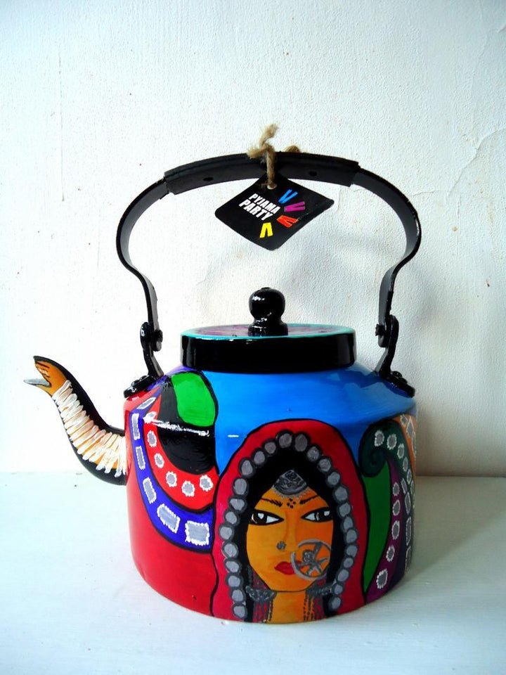 Lifestyle craft titled 'Banjaran Tea Kettle', 9x9x7 inches, by artist Rithika Kumar on Aluminium