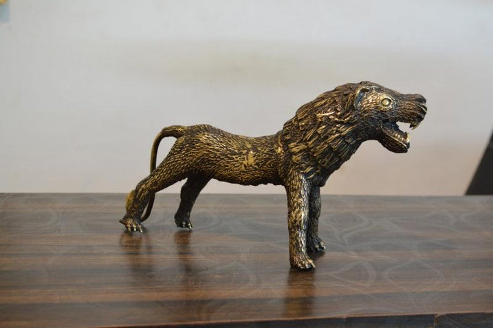 Animals sculpture titled 'Bastar Tiger 2', 6x8x4 inches, by artist Kushal Bhansali on Brass