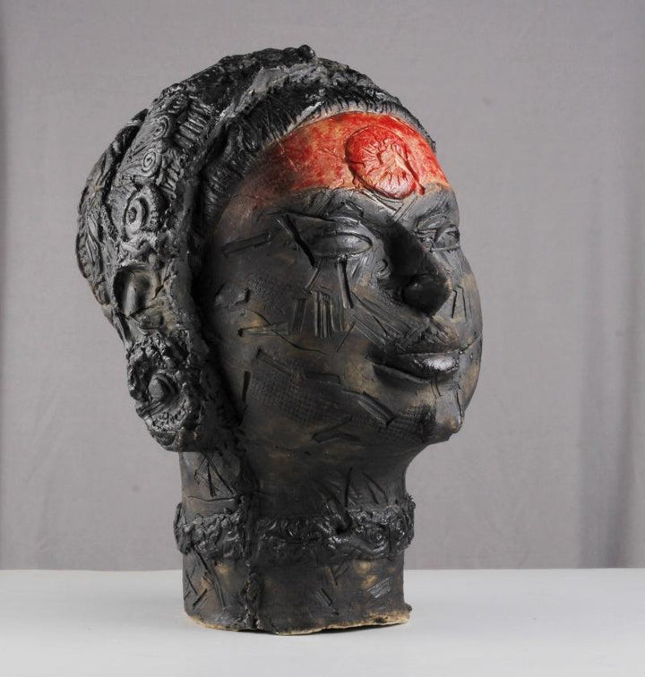 Figurative sculpture titled 'Battered By Time', 13x13x8 inches, by artist MAHESH ANJARLEKAR on Ceramics