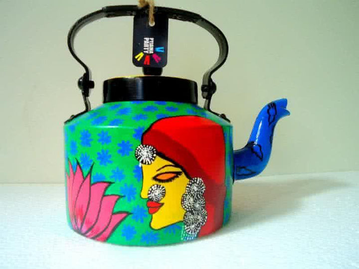 Lifestyle craft titled 'Bewitched Tea Kettle', 9x9x7 inches, by artist Rithika Kumar on Aluminium