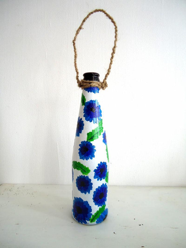 Lifestyle craft titled 'Bottle Planter Lavender', 9x3x9 inches, by artist Rithika Kumar on Recycled Glass