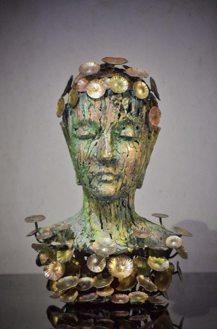 Figurative sculpture titled 'Buddha With Nature', 16x10x6 inches, by artist Dinesh Singh on Brass