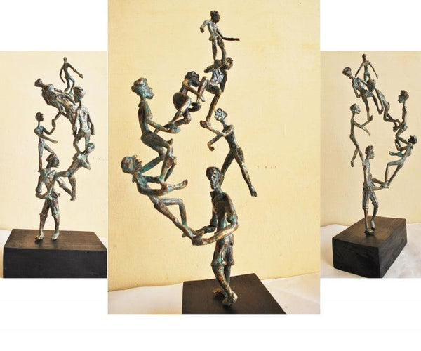 Figurative sculpture titled 'Celebration 2', 18x9x8 inches, by artist Renu Bala on Wood, Metal