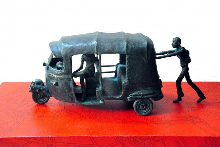 Transportation sculpture titled 'Convincing For Destination', 24x48x24 inches, by artist Rohit Sharma on Bronze, Wooden