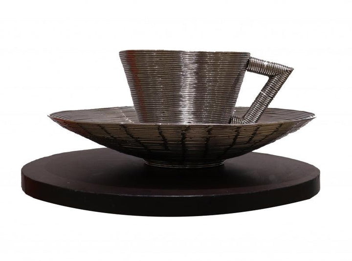 Still-life sculpture titled 'Cup And Saucer', 20x24x24 inches, by artist Ram Kumbhar on Stainless Steel