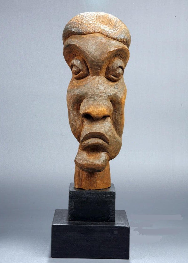 Figurative sculpture titled 'Distortion Of The Face 2', 14x5x4 inches, by artist Sucharita Adhikary on Wood