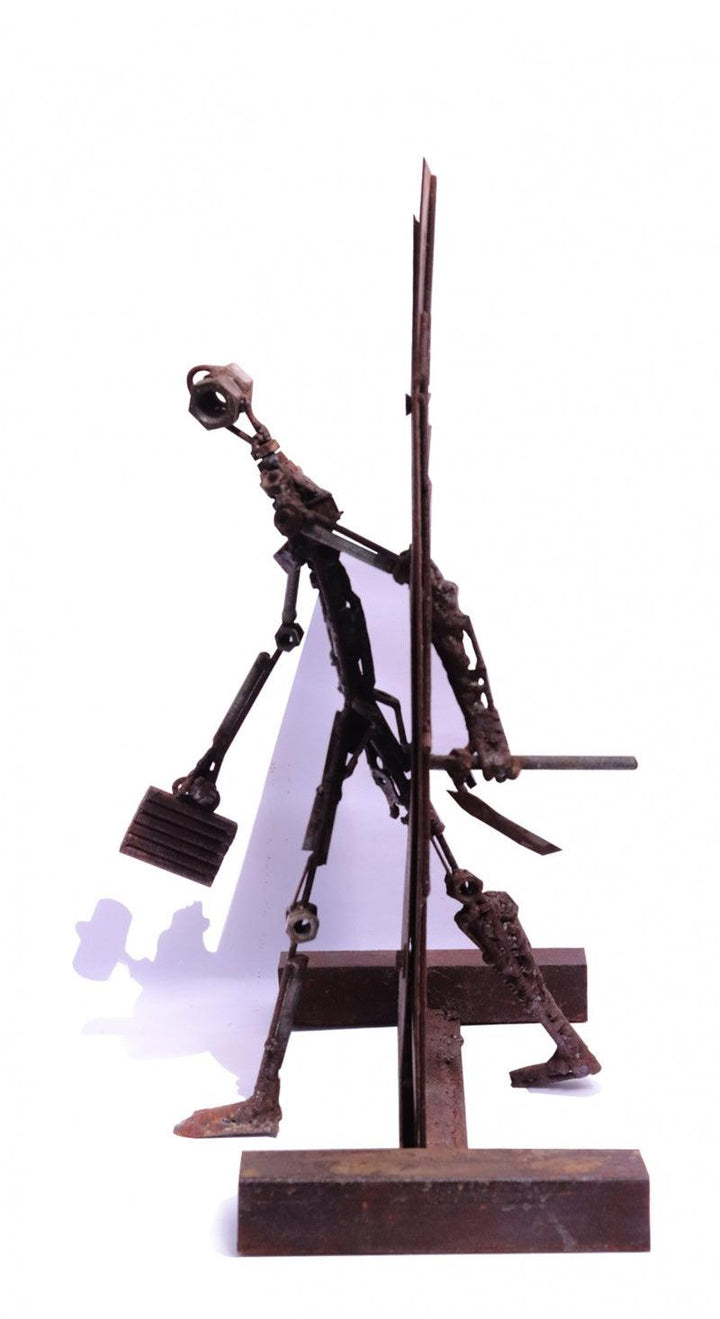 Figurative sculpture titled 'Diversion', 20x14x1 inches, by artist Chintada Eswararao on Iron, Rust