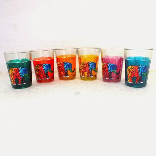 Lifestyle craft titled 'Elephants Cutting Chai Glasses', 3x2x2 inches, by artist Rithika Kumar on Glass