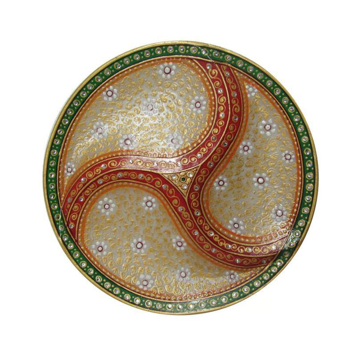 Lifestyle craft titled 'Embossed Dry Fruit Designer Plate', 9x9x5 inches, by artist Ecraft India on Marble