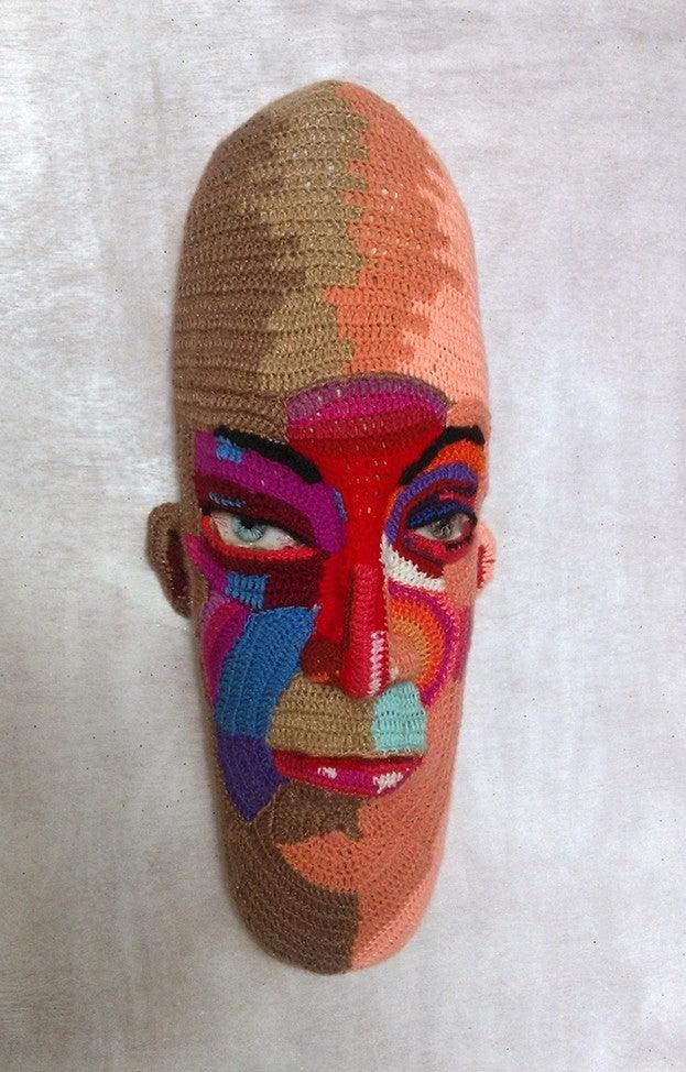 Figurative sculpture titled 'Face 17', 21x9x6 inches, by artist Archana Rajguru on Mixed Media