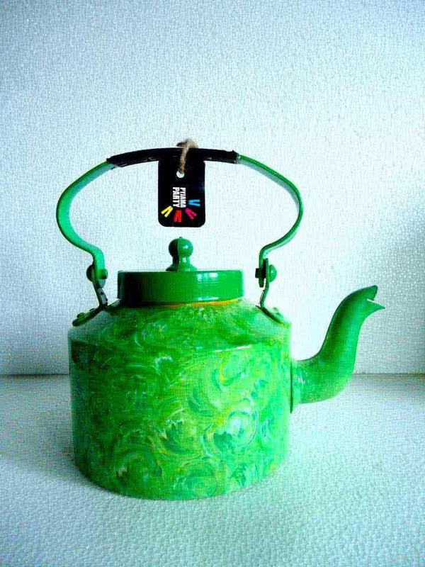 Lifestyle craft titled 'Foliage Textured Tea Kettle', 9x9x7 inches, by artist Rithika Kumar on Aluminium