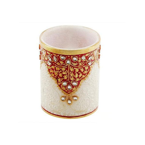 Lifestyle craft titled 'Gold Embossed Pen Stand', 4x3x3 inches, by artist Ecraft India on Marble