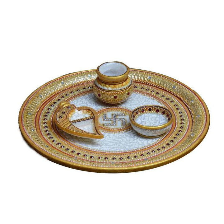 Lifestyle craft titled 'Golden Marble Pooja Thali with Swastik', 9x9x2 inches, by artist E Craft on Marble