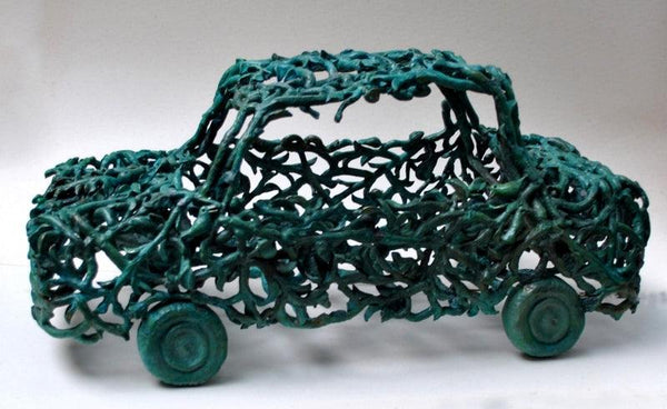 Transportation sculpture titled 'Green Car', 11x19x10 inches, by artist Tarun Maity on Bronze