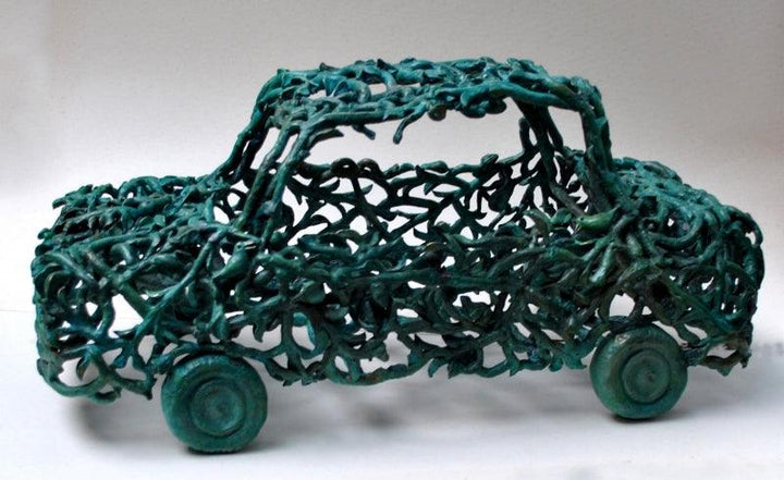 Transportation sculpture titled 'Green Car', 11x19x10 inches, by artist Tarun Maity on Bronze