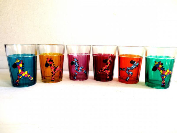 Lifestyle craft titled 'Horsing Around Cutting Chai Glasses', 3x2x2 inches, by artist Rithika Kumar on Glass