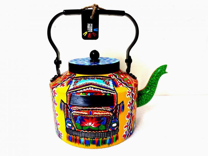 Lifestyle craft titled 'Intrensic Tea Kettle', 9x9x7 inches, by artist Rithika Kumar on Aluminium