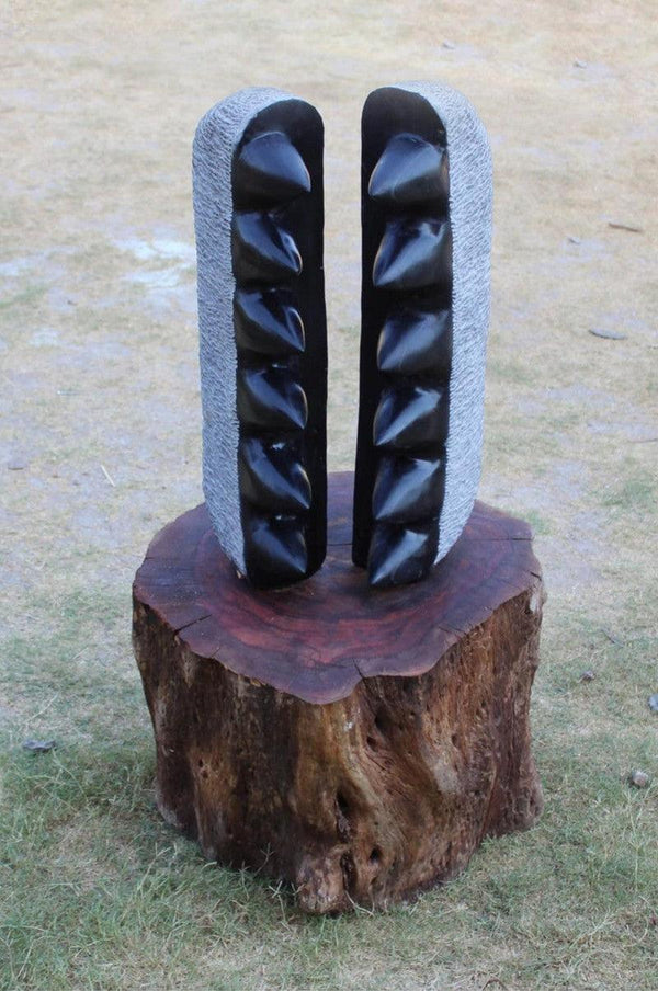 Abstract sculpture titled 'Is Their Any Space To Escape', 19x15x7 inches, by artist Tanzeem Baredia on Black Marble