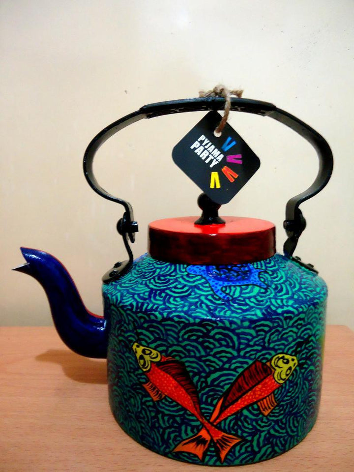 Lifestyle craft titled 'Japanese Fish Tea Kettle', 9x9x7 inches, by artist Rithika Kumar on Aluminium