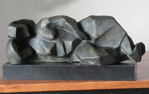 Figurative sculpture titled 'Liying Lady', 5x13x4 inches, by artist Shankar Ghosh on Bronze