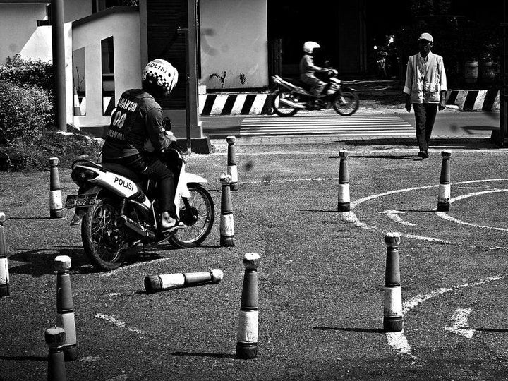 Realistic photography titled 'Looking driving license', 11x15 inches, by artist Rahmat Nugroho on