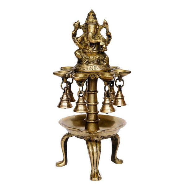 Religious handicraft titled 'Lord Ganesha With Diya And Bells', 12x6x6 inches, by artist Brass Handicrafts on Brass