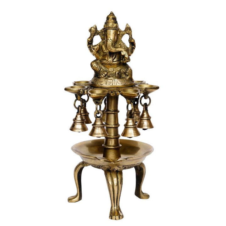 Religious handicraft titled 'Lord Ganesha With Diya And Bells', 12x6x6 inches, by artist Brass Handicrafts on Brass