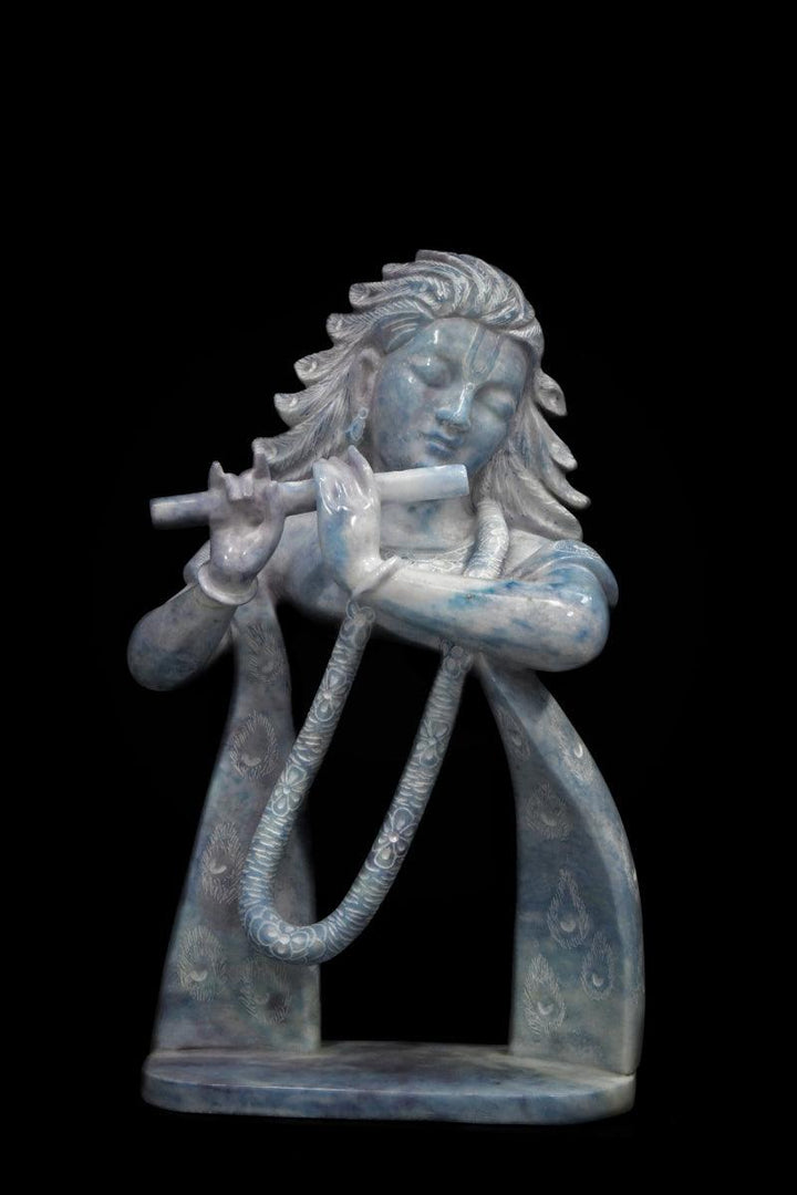 Religious sculpture titled 'Lord Krishna Playing Flute', 24x15x9 inches, by artist Ravi Mishra on Mixedmedia