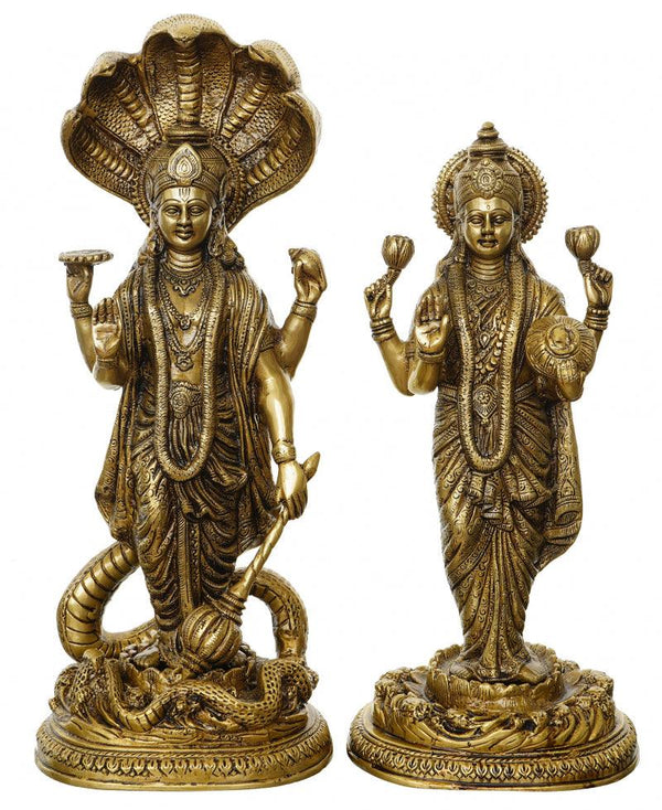 Religious handicraft titled 'Lord Vishnu And Goddess Laxmi', 18x7x5 inches, by artist Brass Handicrafts on Brass