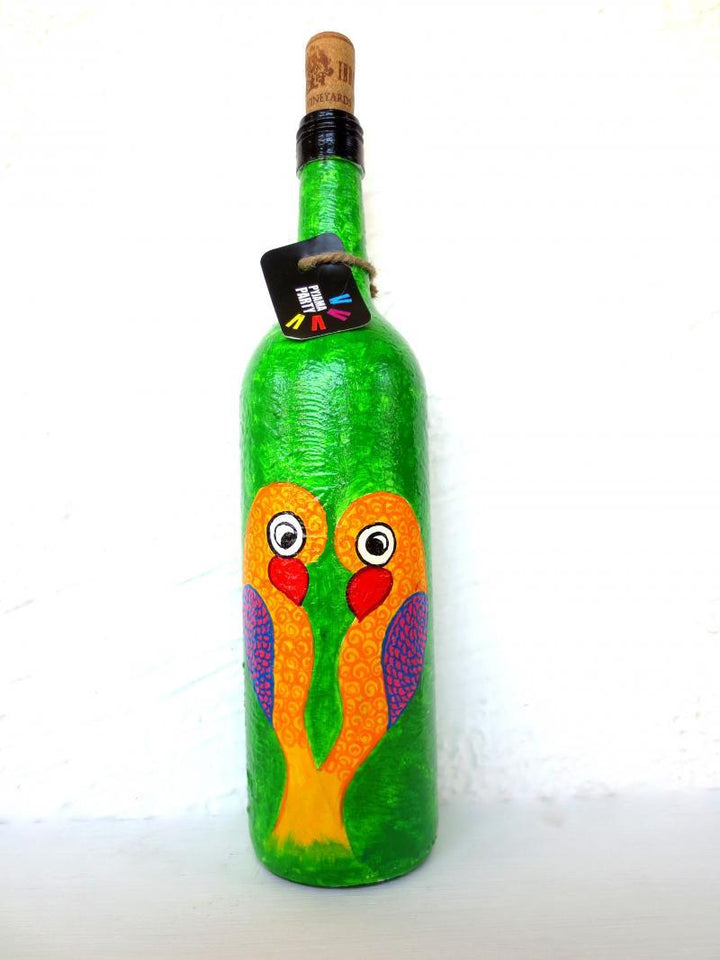 Lifestyle craft titled 'Love Birds Hand Painted Glass Bottles', 12x3x12 inches, by artist Rithika Kumar on Recycled Glass