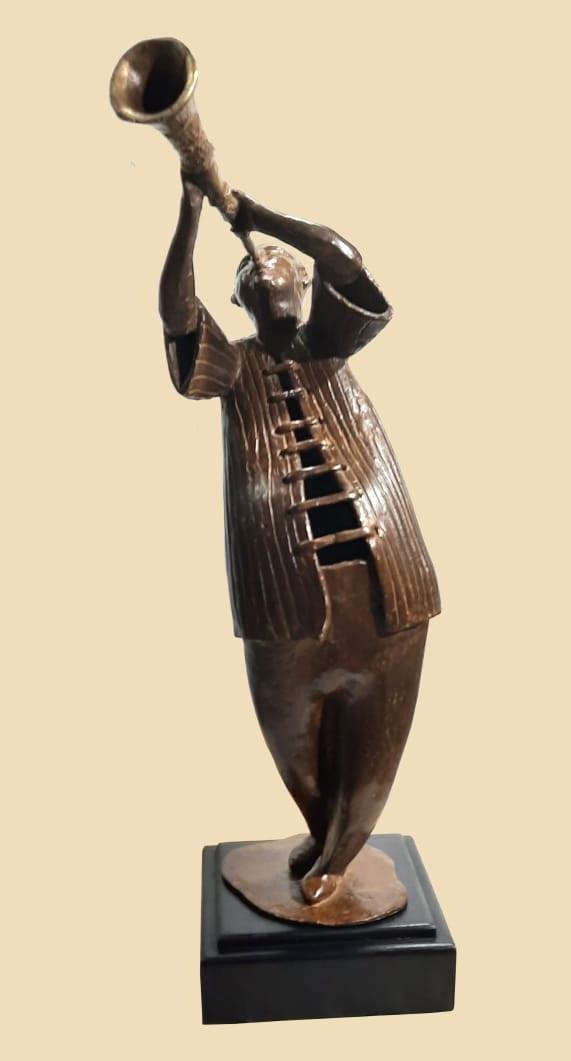 Figurative sculpture titled 'Melodist', 18x8x7 inches, by artist Subrata Paul on Bronze