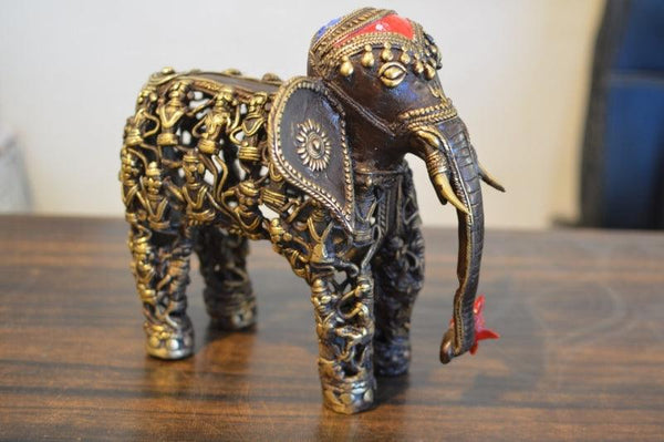 Animals sculpture titled 'Men Figure Elephant 5', 10x8x3 inches, by artist Kushal Bhansali on Brass