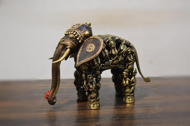 Animals sculpture titled 'Men Figure Elephant', 10x13x4 inches, by artist Kushal Bhansali on Brass