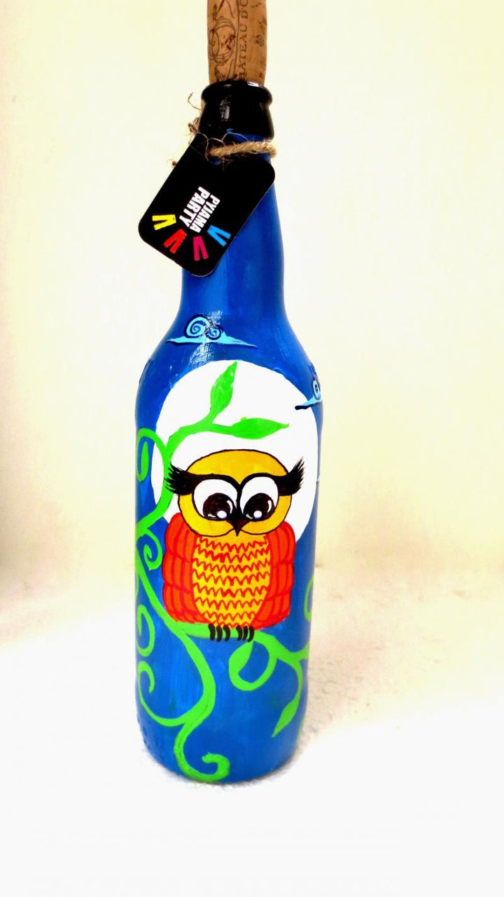 Lifestyle craft titled 'Midnight Owl Hand Painted Glass Bottles', 12x3x12 inches, by artist Rithika Kumar on Recycled Glass