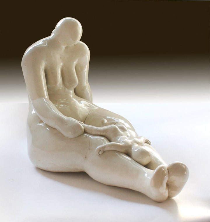 Nude sculpture titled 'Motherchild I', 9x11x15 inches, by artist MAHESH ANJARLEKAR on mix media