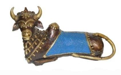 Religious sculpture titled 'Nandi Sitting', 6x12x4 inches, by artist Kushal Bhansali on Brass