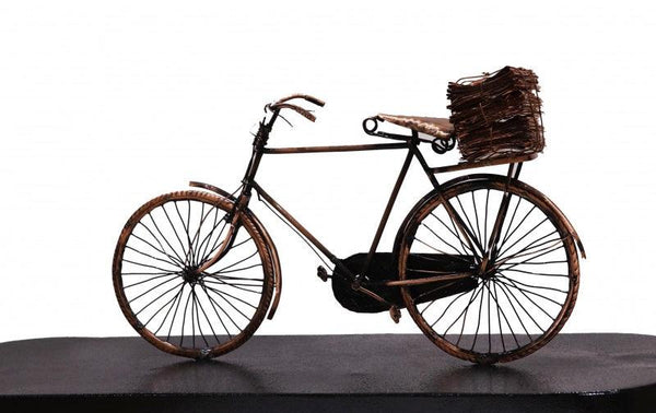 Still-life sculpture titled 'Newspaper On Bicycle', 11x24x8 inches, by artist Ram Kumbhar on Mixedmedia