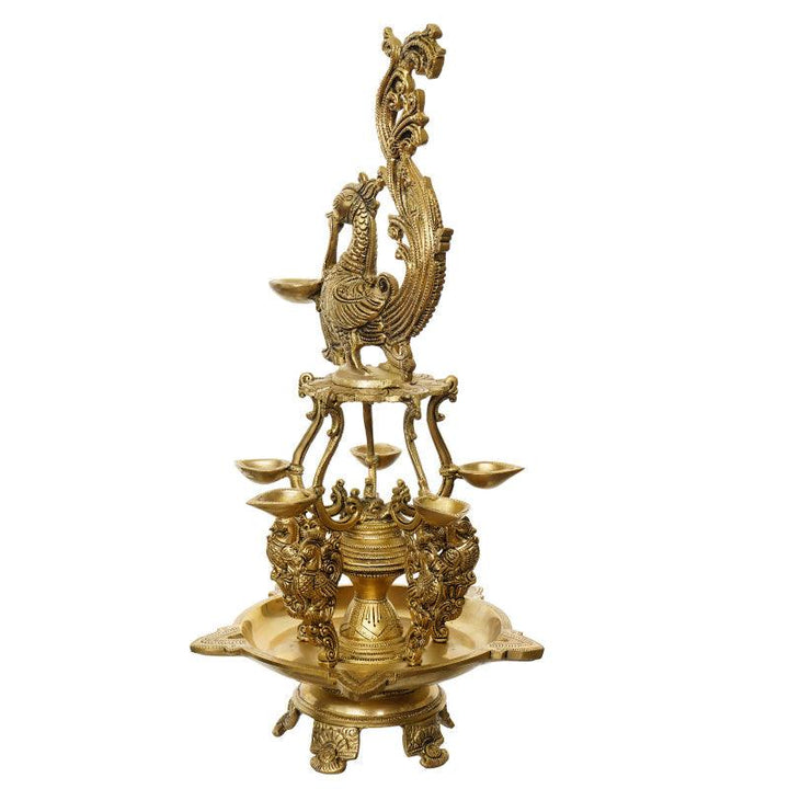 Religious handicraft titled 'Peacock Showpiece Diya With Stand', 20x9x9 inches, by artist Brass Handicrafts on Brass