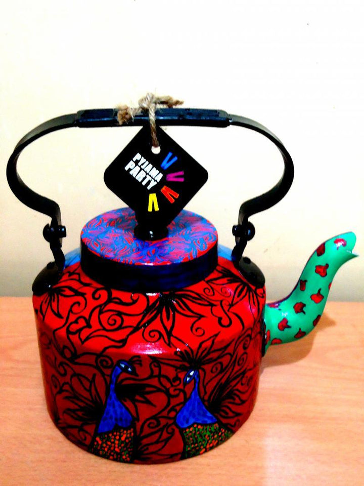 Lifestyle craft titled 'Peacock Tea Kettle', 9x9x7 inches, by artist Rithika Kumar on Aluminium