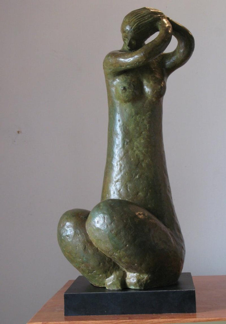 Figurative sculpture titled 'Prasadhan 2', 21x9x9 inches, by artist Shankar Ghosh on Bronze