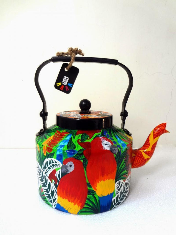 Lifestyle craft titled 'Rain Forest Limited Edition hand painted kettle', 9x9x7 inches, by artist Rithika Kumar on Aluminium