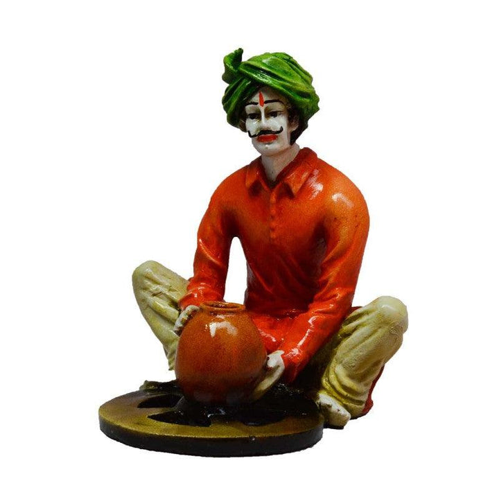 Lifestyle craft titled 'Rajasthani Craftmen Statue making Pot', 6x4x5 inches, by artist E Craft on Synthetic Fiber