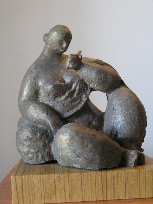 Figurative sculpture titled 'Reading 2', 13x12x12 inches, by artist Shankar Ghosh on Bronze