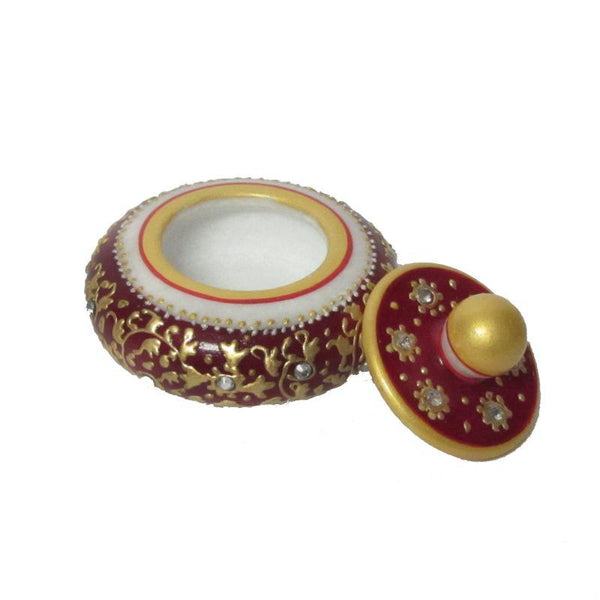 Lifestyle craft titled 'Red Round Sindoor Holder', 3x3x2 inches, by artist Ecraft India on Marble