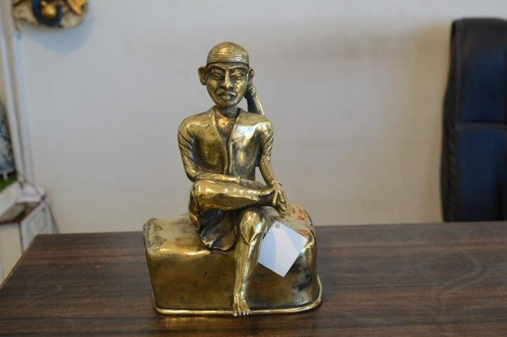 Religious sculpture titled 'Sai', 11x8x6 inches, by artist Kushal Bhansali on Brass