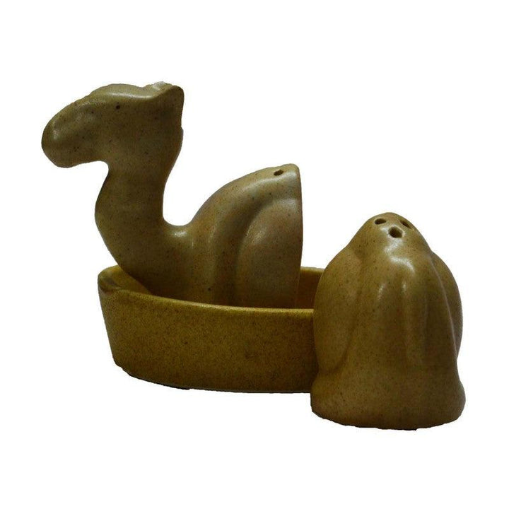 Lifestyle craft titled 'Salt and Pepper Set in Camel Shape', 4x5x3 inches, by artist E Craft on China Clay