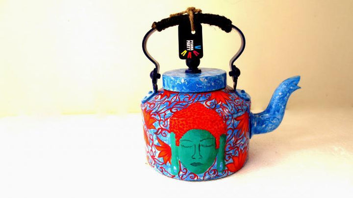 Lifestyle craft titled 'Shades Of Buddha Blue Tea Kettle', 9x9x7 inches, by artist Rithika Kumar on Aluminium